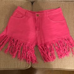 Pink Fringe Shorts That Fit Daisy Duke Style. Cute And Stylish With Front And Back Pockets! #Katchinglooks Trendy Cotton Fringe Shorts, Beach Cotton Jean Shorts With Short Legs, Cotton Jean Shorts For Beach With Short Legs, Cotton Jean Shorts For The Beach, Trendy Fringed Shorts For Summer, Summer Cotton Jean Shorts With Fringe, High Waist Cotton Fringe Shorts, Summer Fringe Shorts, Cotton Fringe Shorts