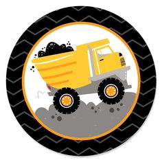 a round sticker with a yellow dump truck on it's side and black chevroned background