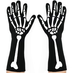 two hands with bones and bones painted on them, one is black and the other is white