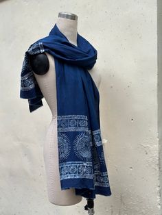 Indigo Hand Dyed Silk scarf, Batik blue Scarf, Silk blue Scarf, Unisex blue scarf - Pattern 2 Material: 50% silk - 50% Rayon Size: Width 90cm (35 inchs), length 180cm (70 Inchs) Silk scarves with batik painting and indigo dyeing are a new creation of ours. Usually, the Hmoob people paint batik and dye indigo on cotton or hemp fabric. We used the traditional Hmoob batik drawing technique with beeswax and indigo dyeing on silk fabric to create these beautiful scarves. Unisex style scarf suitable for men and women  At the two ends of the scarf, we did not sew the edges but left tassels made of silk fibers so that you can feel the natural silk material, this will help you love and be proud of your scarf more. Process of producing a silk scarf painted with beeswax and dyed indigo: - Collect bee Indigo Plant, Hand Dyed Silk Scarf, Hemp Fabric, Silk Scarf Painting, Blue Scarf, Indigo Dye, Silk Material, Hand Dyed Silk, Natural Silk