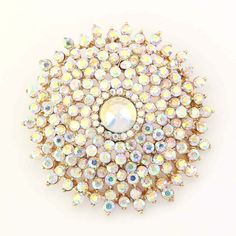 "Gorgeous crystal brooch AB iridescent embellishment, which can be used for your DIY project - rainbow wedding, bridal sash, cake and frame decorations, pillow and clutch decor, crafts, scrap booking and much more.  Size: 2\"H x 2\"W Stones color: Iridescent (AB) Metal: Gold plated This iridescent gold brooch can be ordered with pin in the back to wire into brooch bouquet, add to wedding gown or dress sash, or any number of other craft projects or without the pin as a flat back embellishment for your sew-on, glue-on DIY project. More IRIDESCENT brooches - https://www.etsy.com/shop/Crystalitzy?section_id=16137618 Please note that this crystal rhinestone embellishment has flat backing, it is suitable only for your sew-on or glue-on DIY project however if you prefer to have it with pin so you Rainbow Iridescent, Bee Pin, Rainbow Wedding, Prom Flowers, Aurora Borealis Crystal, Iridescent Crystal, Bee Brooch, Dress Sash, Brooch Bouquet