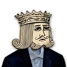 a wooden cutout of a man with a crown on his head, wearing a suit and tie