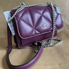 Coach Cj526 Mini Klare Puffy Diamond Quilt Crossbody Deep Berry Handbag Leather Nappa Leather And Smooth Leather Inside Multifunction And Zip Pockets Snap Closure, Fabric Lining Outside Open Pocket Handles Convert To Shoulder Strap With 22" Drop 7" (L) X 5 1/4" (H) X 2" (W Coach Crossbody Bag With Chain Strap, Coach Flap Bag For Everyday Use, Coach Quilted Leather Bag, Coach On-the-go Flap Bag, Coach Flap Bag For On-the-go, Luxury Quilted Coach Bag, Coach Quilted Shoulder Bag For Everyday Use, Coach Bags With Chain Strap For Daily Use, Trendy Coach Bags With Chain Strap