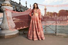 Red modern Lehenga Set, adorned with intricate hand embroidery on raw silk and velvet. The vibrant red hue enhances its allure, while the net blouse features an Indian "Koti" silhouette and European-inspired puff sleeves in raw silk.From Jigar Nikita’s 11:11 In Paris collection DELIVERY TIMEPlease allow 8-12 weeks for your outfit to arrive. FABRIC DETAILSLehenga - Raw Silk & Velvet Blouse - Net and Raw Silk, Dupatta - Net Professional cleaning only. Designer Silk Choli With Resham Embroidery, Red Lehenga With Pallu For Evening, Designer Red Party Set, Designer Red Wedding Set, Designer Silk Choli For Festive Occasions, Designer Silk Lehenga For Festive Occasions, Traditional Red Lehenga For Evening, Designer Silk Choli For Festivals, Red Bollywood Traditional Wear For Evening