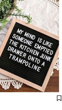 a sign that says, my mind is like someone emptied the kitchen junk drawer onto a trampoline