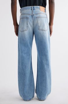 Acne Studio's gives classic bootcut jeans—cut from faded and distressed light-wash nonstretch organic-cotton denim—a modern update with a looser fit. 21" leg opening; 12 1/2" front rise; 16" back rise Zip fly with button closure Five-pocket style 100% cotton Dry clean Made in Italy New Concepts @Nordstrom Faded Flare Jeans With Straight Hem, Faded Denim Flare Jeans With Straight Hem, Faded Relaxed Fit Flare Jeans With Five Pockets, Loose Bootcut Jeans, Bootcut Jeans, Acne Studios, Loose Fitting, Organic Cotton, Light Blue