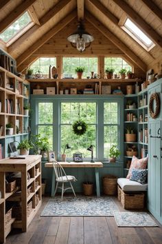 a room filled with lots of wooden shelves and furniture next to a window covered in plants