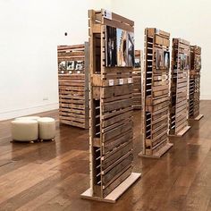 several wooden crates sitting on top of a hard wood floor