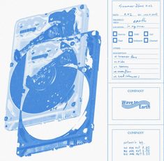 a blue computer hard drive sitting on top of a white paper with words underneath it