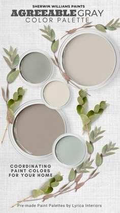 three shades of grey paint with green leaves on the top and bottom, one is light gray