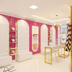 the interior of a store with pink walls and gold trimmings, white tables and chairs