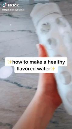 someone is holding their shoes with the words how to make a healthy flavored water