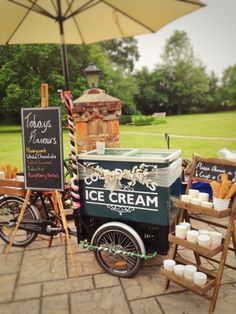 an ice cream cart is set up outside