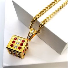 Generous Sized Mans Dice Necklace. 18k Gold Plate With 1x1 Square Pendant. Necklace Is 30 Inch 18k Gold Plated Link. Overall Very Significant Piece. One Of The Most Beautiful Ive Ever Seen. A Very Significant Size Of Noticability. Some Younger Guys Hang On The Rear View Mirror. Gold-tone Jewelry With Diamond Accents As A Gift, Gold-tone Jewelry With Diamond Accents For Gift, Gold-tone Diamond Necklaces For Gifts, Gold-tone Diamond Necklace For Gift, Dagger Necklace, Rings Mens Wedding Bands, Yellow Gold Diamond Ring, Dragon Necklace, Square Pendant