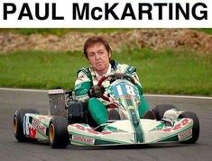 a man is sitting in a go - kart on the road with words that read paul mckarrting