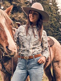 MADE TO WEAR EVERYWHERE A cowgirl can never have too many collared shirts for competition and daily life. Our Women's Wrangler Retro® All-Occasion Western Snap Dress Shirt is crafted a lightweight cotton and recycled materials blend that will keep you comfortable in everything you do. It comes with pointed yokes, pearl snaps, two chest pockets with the signature "W" stitching, and a contrast print at the cuffs. Collared Shirts, Destructed Jeans, Western Women, Loose Fit Jeans, Country Shirts, Short Shirts, Western Outfits, Denim Shop, Women's Tops