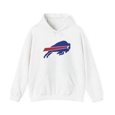 This Buffalo Bills Football Hoodie exudes a sporty and casual vibe, perfect for football enthusiasts and fans. Stay warm and cozy while cheering for your favorite team during game nights or tailgating parties. Ideal for Buffalo Bills fans and NFL football lovers, this hoodie is a must-have for sports-themed gatherings and events. Product features - Spacious kangaroo pouch pocket to keep hands warm - Adjustable drawstring hood for a custom fit - Made from 50% cotton and 50% polyester for durability and comfort - Medium-heavy fabric for a cozy feel and warmth - Ethically grown US cotton used in production Care instructions - Tumble dry: medium - Iron, steam or dry: low heat - Do not dryclean - Machine wash: cold (max 30C or 90F) - Non-chlorine: bleach as needed Sports Team Logo Hooded Top, Game Day Fan Apparel Tops With Drawstring Hood, Fan Gear Hoodie With Team Logo, Team Logo Hoodie Long Sleeve Fan Gear, Sports Fan Hoodie With Long Sleeves, Team Logo Hoodie For Fan Gear, Game Day Team Spirit Hooded Top, Fan Gear Hoodie, Sports Fan Apparel Tops With Drawstring Hood