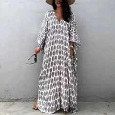 This Kaftan Is Simple Luxury. It Wraps You Up In Beautiful Luxurious Printed Leaf Fabric, Feels Delicate, Light And Soft On The Skin. Wear It Alone, With A Bikini, Over An Outfit During Day Time Or Night. It’s Made Of Quality Viscose Blend Fabric And Is Beautifully Finished. This Kaftan Gives You Effortless Style And Comfort. It’s A Crowd Pleaser And You’ll Love It. No Doubts! Feel Amazing In This Little Lovely Black + White Kaftan Bohemian Print Polyester Viscose Blend Fits Oversized One Size M Cover Up Beach, Coverup Beach, Modest Swimwear, Cotton Linen Dresses, Caftan Dress, Swimsuit Dress, Polyester Dress, Women Long Dresses, Swimwear Cover