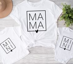 Welcome to our Mommy and Me shirts collection! Our adorable matching shirts are the perfect way to showcase your special bond with your little one. Our Mommy and Me shirts make a great gift for a new mom, a baby shower, or any special occasion. So why not treat yourself and your little one to a set today? We can't wait to see you rocking your matching shirts and making memories together! SHIRT DETAILS We use Bella + Canvas t-shirts. UNISEX sizing - they are meant to have a loose fit. Please refe Matching Tops With Custom Print For Mother's Day, Short Sleeve Shirt With Heart Graphic For Mother's Day, White Shirt With Text Print For Family, Pre-shrunk White Shirt For Mother's Day, Short Sleeve Top With Heart Graphic For Mother's Day, White Family Matching Shirt For Mother's Day, White Shirt With Heart Graphic For Mother's Day, Family Matching Short Sleeve Tops With Heart Graphic, White Shirt With Heart Graphic As Gift