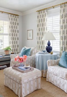 a living room filled with furniture and pillows