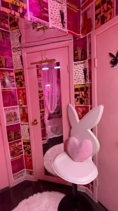 a room with pink walls and furniture in the shape of a bunny's head