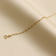 Gold KT: 14K Solid Gold Gold Color: Yellow Gold Chain Lengths: 14" Choker, 16", 18" Chain Widths: 1.5mm Chain Style: Singapore Chain Clasp Closure: Spring Ring Yellow Gold Cable Chain Necklace For Wedding, Wedding Yellow Gold Cable Chain Necklace, Dainty Yellow Gold Chain Necklace With Lobster Clasp, 14k Gold Chain Necklace For Wedding, Dainty Yellow Gold Chain Bracelet With Lobster Clasp, Dainty Formal Chain Necklace With Lobster Clasp, Gold Delicate Chain Bracelet For Anniversary, Delicate Gold Chain Bracelet For Anniversary, Dainty Yellow Gold Snake Chain Bracelet