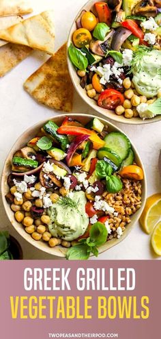 two bowls filled with greek salad and pita bread on top of a white table