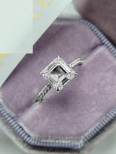 an engagement ring with a princess cut diamond