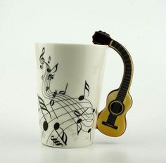 a coffee cup with musical notes on it