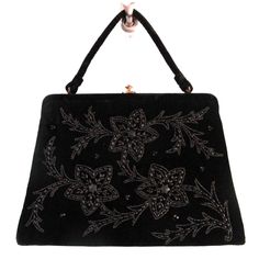 Vintage Soure' Bag, New York City - intricately beaded with jet black beads in a floral pattern, framed in lush velvet. Comes with a gold tone clasp and feet, and a single velvet rope strap. Interior lined with black satin and features an elastic top side pocket. Hard lining at sides is creased on each side toward bottom, does not effect use or style. 1940's - 1950's, made in New York City, United States. Star shape beaded flowers with star shape bead centers. Nice tight clasp. * Vintage Soure' Punch Bowl Set, Beaded Handbag, Shoe Tree, Beaded Purses, Jet Black, Black Satin, Star Shape, Black Beads, Beaded Flowers