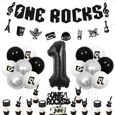 black and white party decorations including balloons, cupcakes, music notes, and one rocks sign