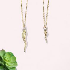 Discover the beauty and symbolism of our Italian Horn Necklace, featuring a dainty gold Cornicello charm that is hand crafted in 14K gold filled, perfect for everyday wear. This elegant necklace is designed to bring a touch of Italian tradition and luck to your look, with the option to choose between a pendant-only version or a complete necklace set. Features: *Material: High-quality 14k gold-filled (water-safe, tarnish-resistant) *Charm Size: 15mm (Small) || 24mm (Large) *Chain: Choose from a v Cornicello Necklace, Italian Horn Necklace, Dainty Gold Jewelry, Italian Horn, Necklace Everyday, Horn Jewelry, Horn Necklace, Italian Jewelry, Everyday Necklace