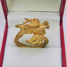 Here is a great Hand carved DRAGON ring. Cast in solid 14K gold and also available in both 18K and 22K gold. Please note that the ring in the images is 18K gold. If you go to the color drop down menu you will see the prices for 18K and 22K gold rings. This ring can be easily sized and is available in all sizes from a 5.5 up to a 15. The ring in the images is shown in a size 10 and weighs approximately 8.5 to 9 grams in 14K gold and approximately 10.5 grams in 18K and approximately 12.5 grams in Gold Ceremonial Rings With Carved Details, Gold Carved Rings For Ceremonial Occasions, Gold Ceremonial Carved Rings, Ceremonial Carved Gold Rings, Heirloom Gold Carved Ring, Heirloom Carved Gold Rings, Heirloom Style Carved Gold Rings, Carved Gold Ring Jewelry, Unique Carved Yellow Gold Ring