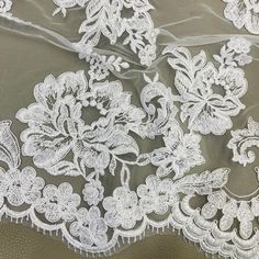 Handmade, high quality Double Sided Floral Lace Trimming Corded Embroidered on 100% Polyester Net Mesh. Beautiful on wedding dresses, evening gowns, dance costumes, and more. Content: 100% Polyester / Minimum Order: 1 Yard / Size: Approximately 17.5" Wide / Ships within 24 business hours. Colors: This product comes in 4 different colors. Quinceanera Crown, For Wedding Dresses, Embroidered Trim, Corded Lace, Lace Trims, Bridal Tiara, Champagne Color, Dresses Evening, Quinceanera Dresses