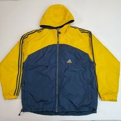 Vintage 90's Adidas Fleece Lined Embroidered Colorblock Jacket Size Large Nylon "Pre-owned" there is some scuffing to rear lower right back blue fabric and there is a small hole near edge stiching in same area, another scuff to mid left base now fabric, there are some stains on both arm cuffs yellow fabric and on left arm elbow area, smoke free, please refer to pictures for condition and issues, Shipped with USPS Priority Mail. Measurements: Armpit to Armpit: 25 in Length: 28 in (shoulder to bas Vintage Nylon Sports Outerwear, 90s Hooded Patchwork Outerwear, 90s Patchwork Hooded Outerwear, Vintage Nylon Outerwear For Sports, Adidas Urban Nylon Windbreaker, Vintage Nylon Outerwear For Streetwear, Adidas Nylon Long Sleeve Windbreaker, Adidas Nylon Windbreaker For Fall, Adidas Urban Nylon Outerwear