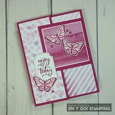 a close up of a card with butterflies on it