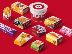 an assortment of fast food items on a red background