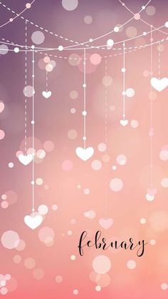 a pink and purple background with hearts hanging from it