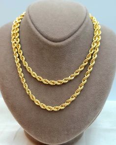 --- Crafted in GUARANTEED HIGH-QUALITY 18-Karat GOLD -- Pure Gold Material, Not Gold-Filled or Plated --- At a 4.5 millimeter thickness this chain is available in 18" to 28" lengths. 18 inches - 4.5 mm : 11.57 gr (grams weight) 20 inches - 4.5 mm : 12.85 gr 22 inches - 4.5 mm : 14.14 gr 24 inches - 4.5 mm : 15.42 gr 26 inches - 4.5 mm : 16.71 gr 28 inches - 4.5 mm : 18.00 gr Closure: Lobster Claw ( Strong and Durable ) Chain style: 18K Rope Chain - Diamond-cut Please feel free to message me for any custom sizing! * A gold Rope chain necklace is an accessory that instantly takes your style to the next level; Wear it all day, Everyday. it's also very study to hold your favorite pendant or ring! Gift for him, birthday, anniversary, Christmas gift! * About 18K Gold: 18K gold pieces are crafted Real Gold Chains, Chain Diamond, Gold Rope Chains, Rope Chain Necklace, Pure Gold, Rope Chain, Diamond Cut, Birthday Anniversary, Gold Material