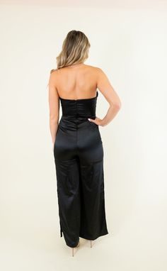 Rhinestone band across top Strapless Side slits Zipper in back Non-sheer 100% Polyester SIZES: SMALL MEDIUM LARGE Introducing our Rhinestone Strapless Satin Jumpsuit - the perfect addition to your wardrobe! This black jumpsuit features a stunning rhinestone design on a flattering strapless silhouette. Made with luxurious satin fabric, it's perfect for a night out or special occasion. Level up your style game with this one-of-a-kind piece! SIZE XS S M L XL 2XL 3XL FITS A SIZE 00-0 2-4 6-8 10-12 1 Platform Heels Boots, Top Strapless, Satin Jumpsuit, Sandal Platform, Blue And White Dress, Platform Sandals Heels, Rhinestone Designs, Black Jumpsuit, Dress Romper