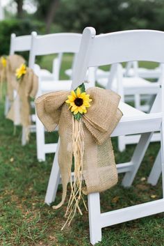 the chairs are decorated with burlocks and sunflowers