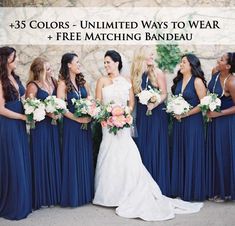 a bride and her bridal party in blue dresses