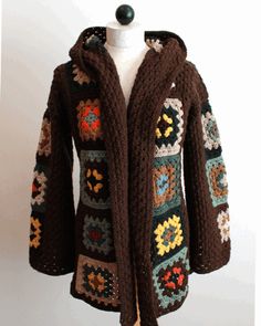 a brown jacket with multicolored designs on it