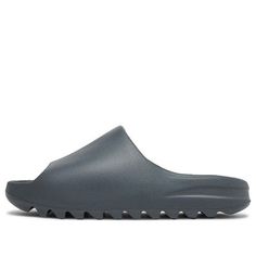 The adidas Yeezy Slide Slate Grey offers a lightweight and durable design. The color palette features a subtle yet versatile slate grey shade, making them suitable for various ensembles. With strategic cutouts and a breathable lining, these slides prioritize comfort. The outsole boasts a textured pattern for traction and stability. Perfect for casual wear or post-workout relaxation, these slides blend style and functionality seamlessly. The adidas Yeezy Slide Slate Grey is a collaborative creati Slippers Yeezy, Yzy Slides, Yeezy Boost 350 Outfit, Adidas Yeezy Slides, Grey Yeezy, Adidas Yeezy Slide, Shoes For School, Yeezy Slides, Men Sandals