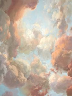 the sky is filled with many different colored clouds in pastel colors, including pinks and browns