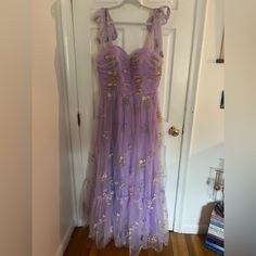 Long, Tulle, Lavender Dress With Floral/Butterfly Stitching Details. With Corset Top, Lace Up Back, And Adjustable/Tie Straps. Size 16. Never Been Worn! Purple Tulle Dress For Garden Party, Purple Floor-length Dress For Garden Party, Green Sequin Gown, Sequence Gown, Lavender Prom Dresses, Detailed Dress, Lavender Dress, Chiffon Cocktail Dress, Tulle Homecoming Dress