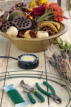 Wreath supplies on a whitewashed wood table Homemade Bird Feeders, Wreath Project, Diy Bird Feeder, Diy Birds, Autumn Decorating, Bird Feeder, The Birds, Diy Wreath, Bird Feeders