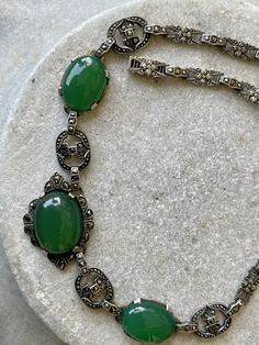 Circa 1920s Beautiful Authentic Art Deco Sterling Silver Green Chrysoprase Marcasite Vintage Antique Necklace Art Deco Jewelry Measeures aprox 17 inches around Vintage Oval Jade Necklace, Vintage Jade Necklace For Formal Occasions, Antique Green Oval Necklace, Victorian Oval Green Necklace, Ornate Green Oval Necklaces, Vintage Green Oval Necklace, Antique Green Gemstone Necklace, Antique Green Gemstone Necklaces, Art Deco Green Cabochon Jewelry