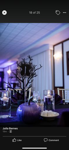 the table is set with candles and place settings