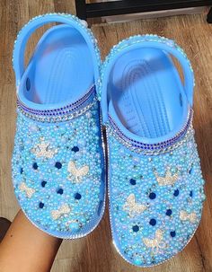 These are a custom design, inspired by an oceanic mermaid feel. These crocs are finished with multiple shades of blue, with silver accents.  This is a size Women's 8 (Men's 6). Blinged Out Crocs, Bedazzled Crocs, 50 Shades Of Blue, Mermaid Custom, Blue Crocs, Custom Crocs, Crocs Fashion, Ice Spice, Clogs And Mules